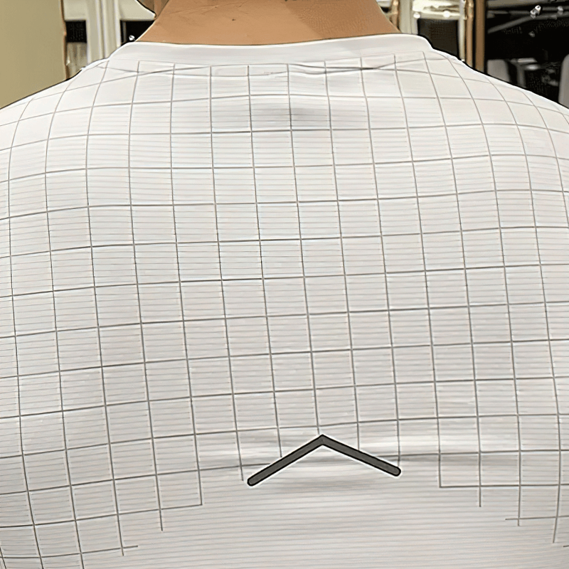 Back view of Men's Grid-Print Quick-Dry Gym Tee showing grid pattern and quick-dry fabric design.