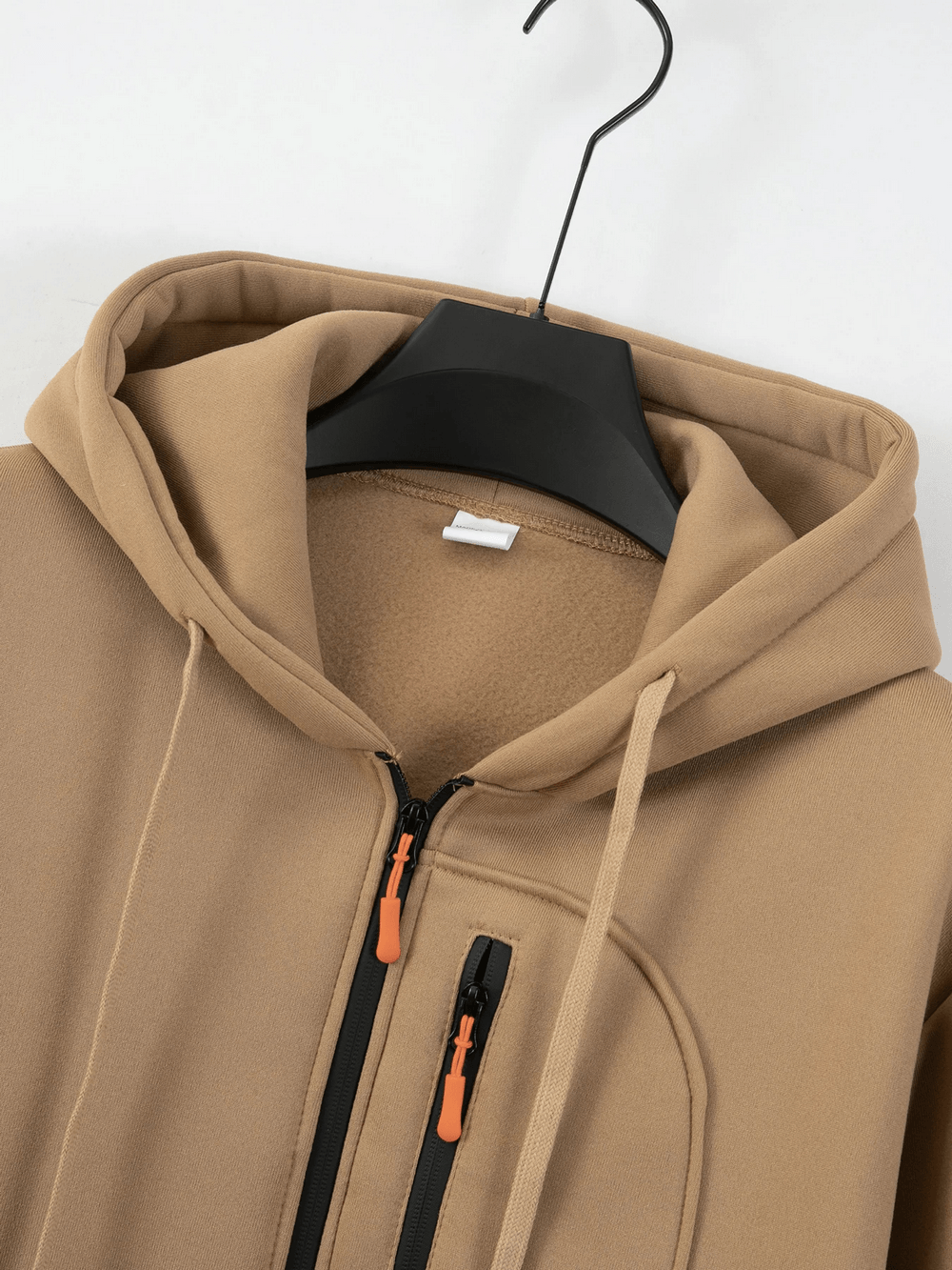 Men's Half Zip Utility Hoodie with Zipper Pocket - SF4616 displayed on a hanger, featuring a hood and front zip pouch.