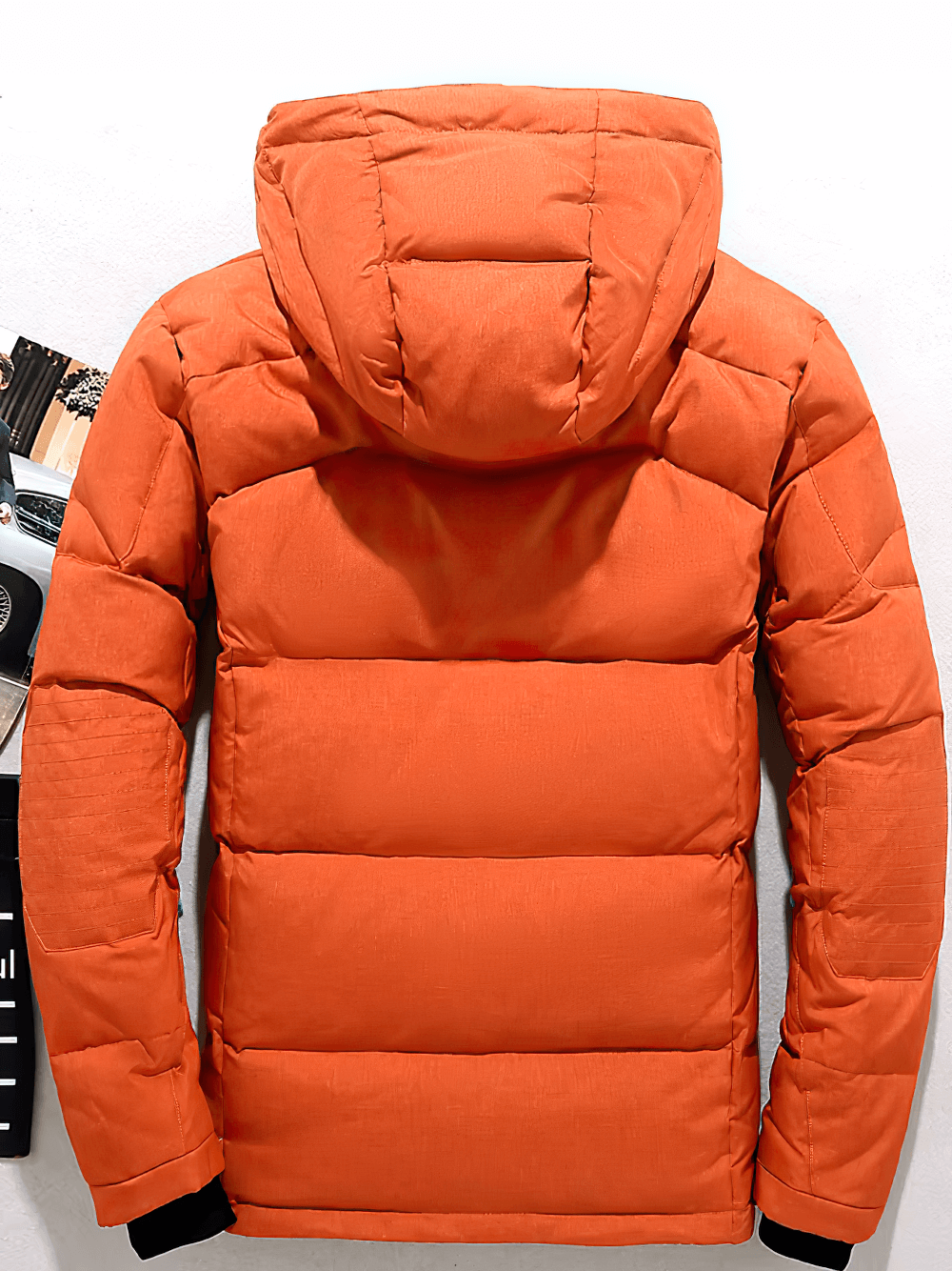 Back view of orange men's hooded duck down winter parka, thick and warm with detachable hood, full sleeves, and multiple pockets.