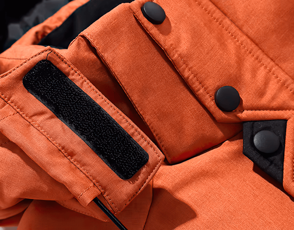 Close-up of an orange Men's Hooded Duck Down Thick Jacket Parka SF2267 with button details and velcro strap.