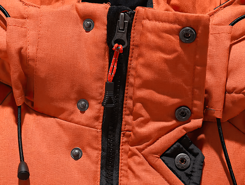 Close-up of orange men's hooded duck down jacket with zipper and buttons, showcasing durable fabric and cozy design for winter warmth.