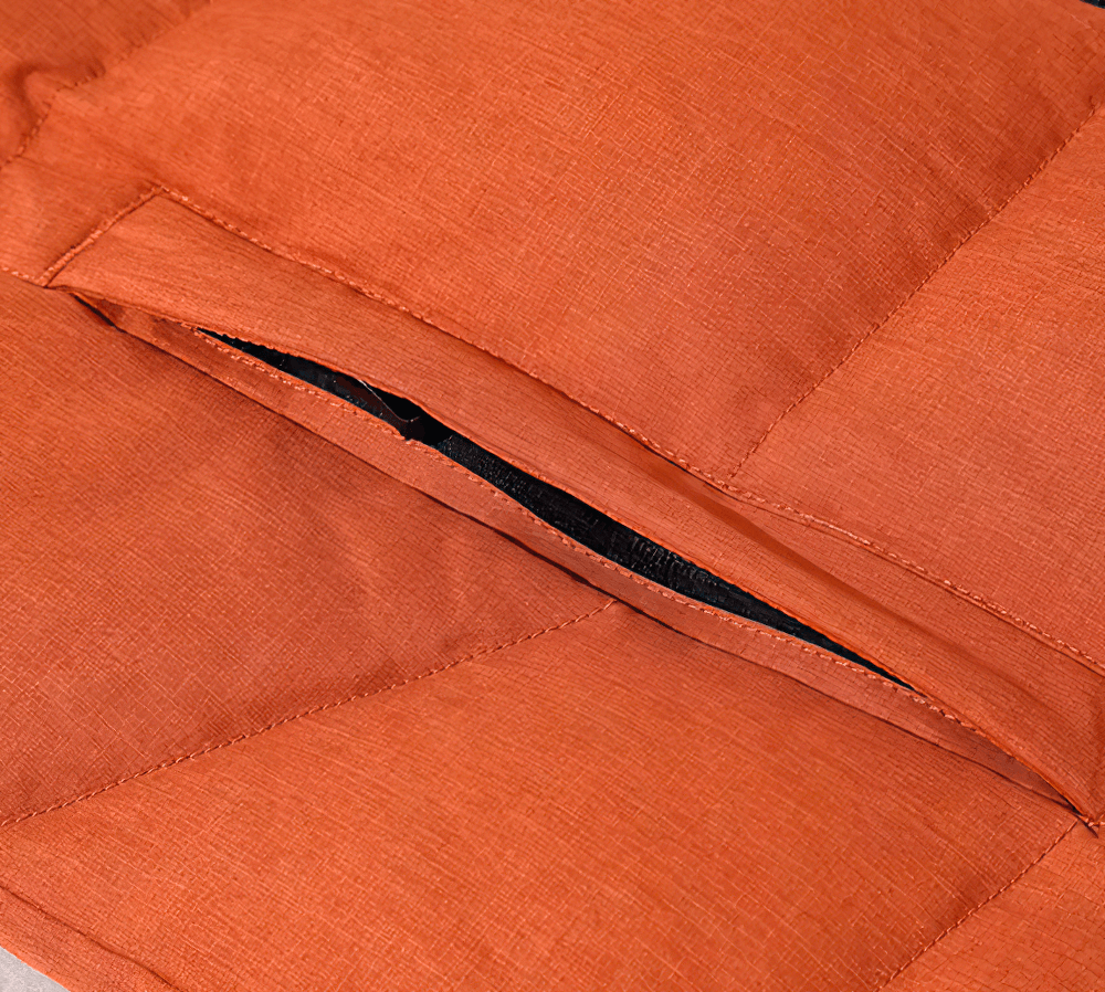 Close-up of orange men's duck down parka with zipper pocket detail, showcasing thick, thermal material. Winter jacket SF2267.