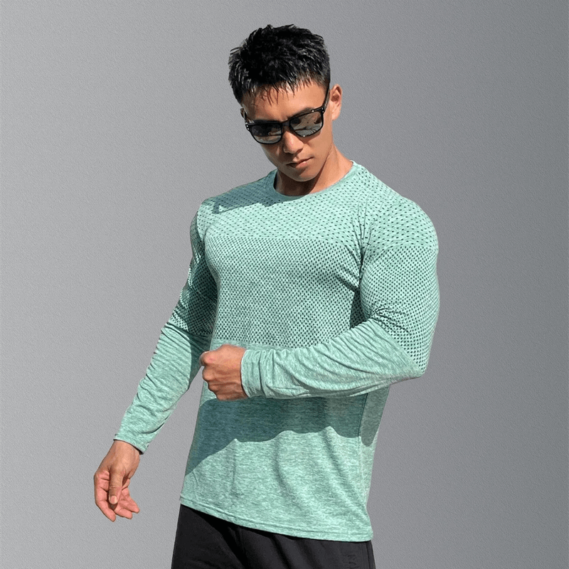 Model wearing men's long sleeves quick-dry workout shirt SF1922 in green, showcasing breathable cotton blend fabric and stylish design.