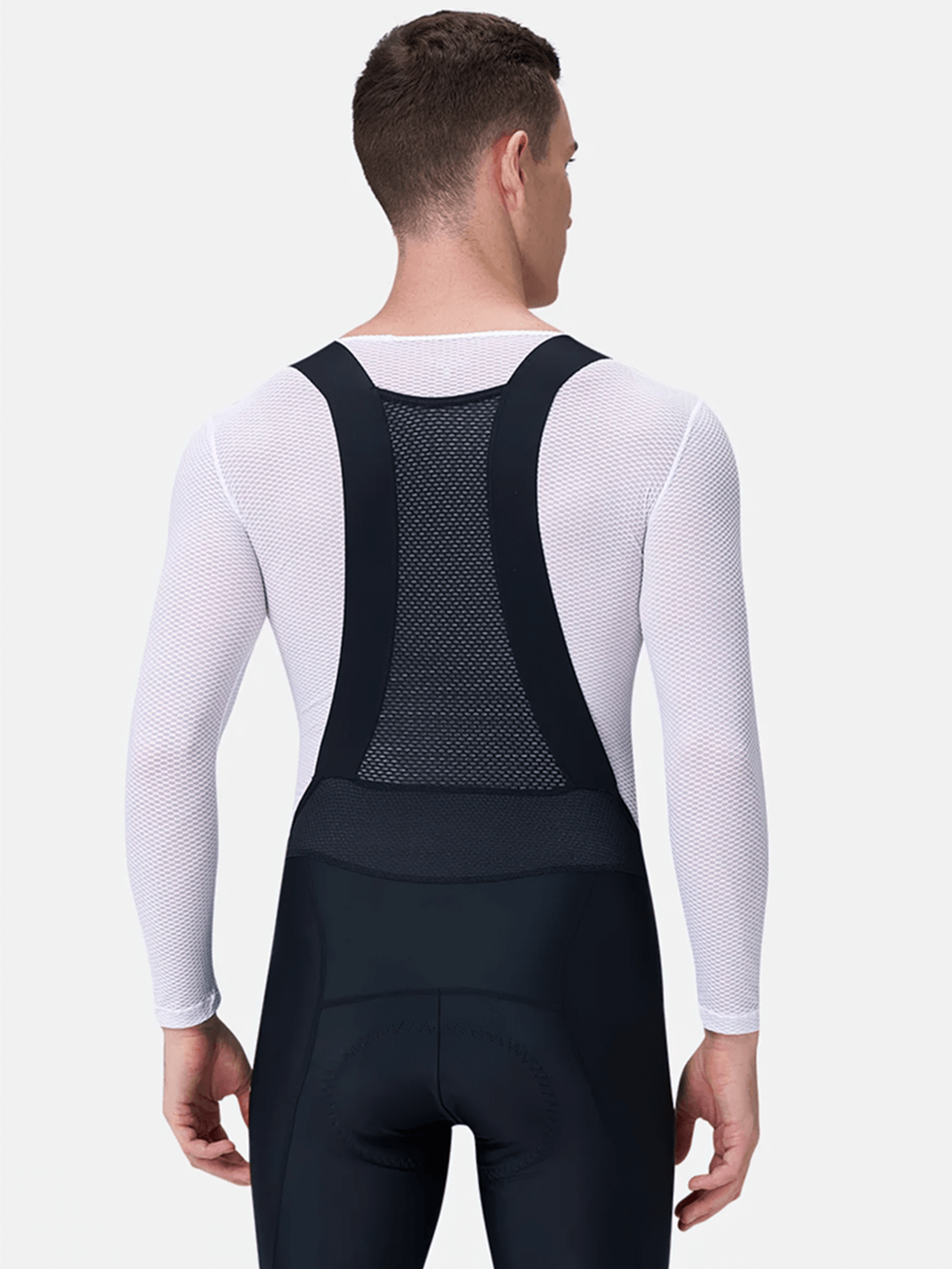 Cyclist wearing men's mesh long-sleeved cycling base layer SF2572 in white, showcasing back design and breathable fabric.