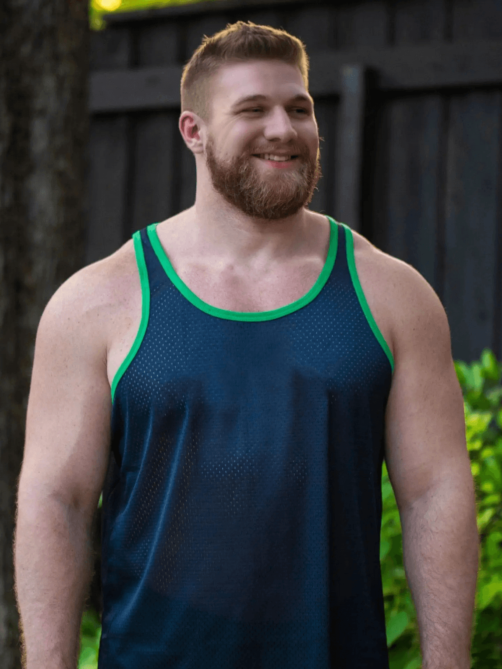 Men's Mesh Loose Gym Tank Top for Active Wear - SF4170 modeled outdoors, showcasing sleeveless design and breathable fabric.