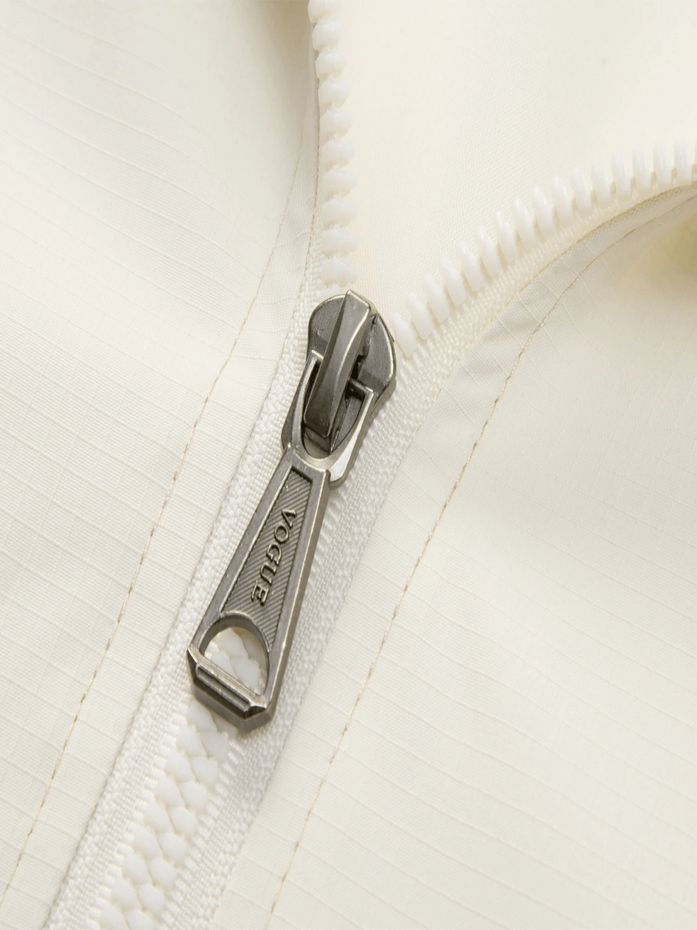Close-up of zipper on Men's Outdoor Hooded Color Block Windproof Jacket - SF4223, showcasing durable design and craftsmanship.
