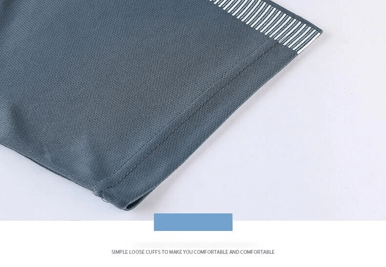 Close-up of men's performance shorts with striped cuffs, highlighting breathable, quick-dry polyester fabric in a sleek design.