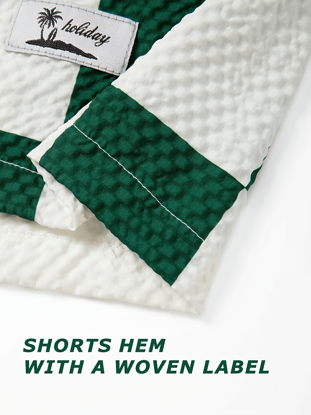 Men's Plaid Seersucker Beach Shorts with Mesh Liner - SF4540 green plaid seersucker hem close-up with woven holiday label