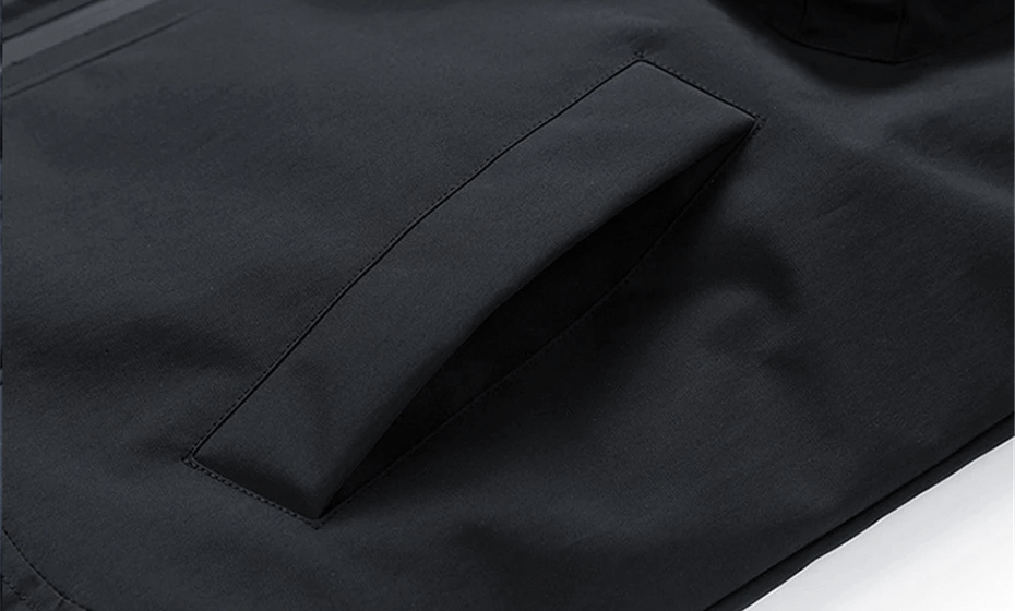 Close-up of black jacket pocket from Men's Puffer Jacket SF2115 with water-resistant fabric, perfect for winter warmth and storage.