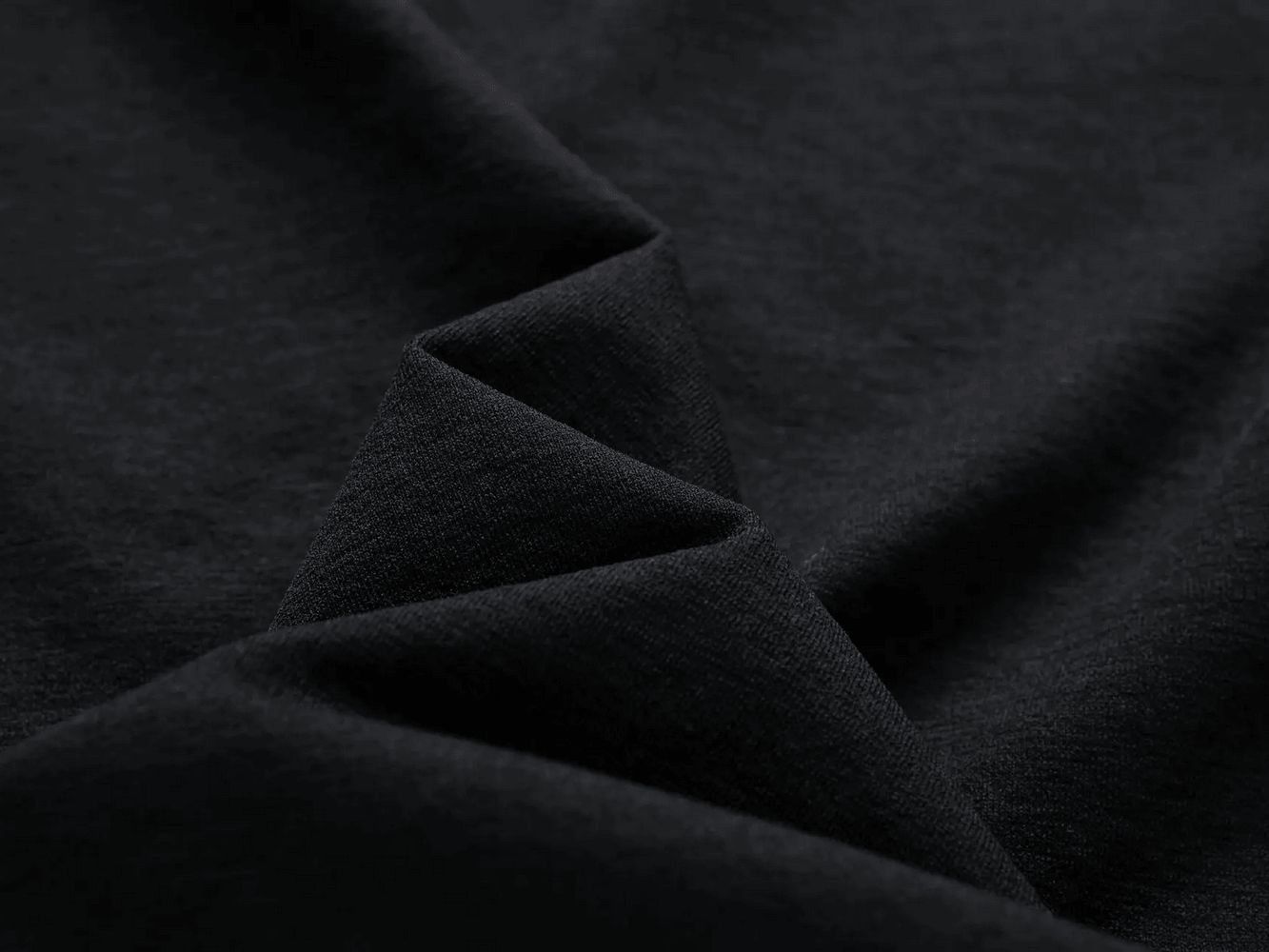 Close-up of the lightweight fabric used in Men's Quarter Zip Running Top with Reflective Trim - SF4589.