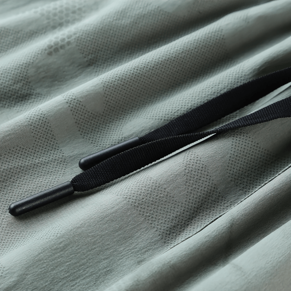 Alt Tag: Men's Quick-Dry Athletic Shorts with Camo Print - SF4468 close-up of marble camo quick-dry fabric and black drawstring, ready to sweat