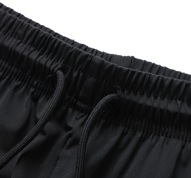 Close-up of men's quick dry athletic shorts with elastic drawstring waist in black, featuring a nylon-spandex blend. Model SF1968.