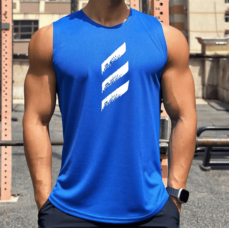 Men's blue quick-dry sleeveless sports tank top with stylish print, worn by a man in a gym setting, showcasing his muscular build.