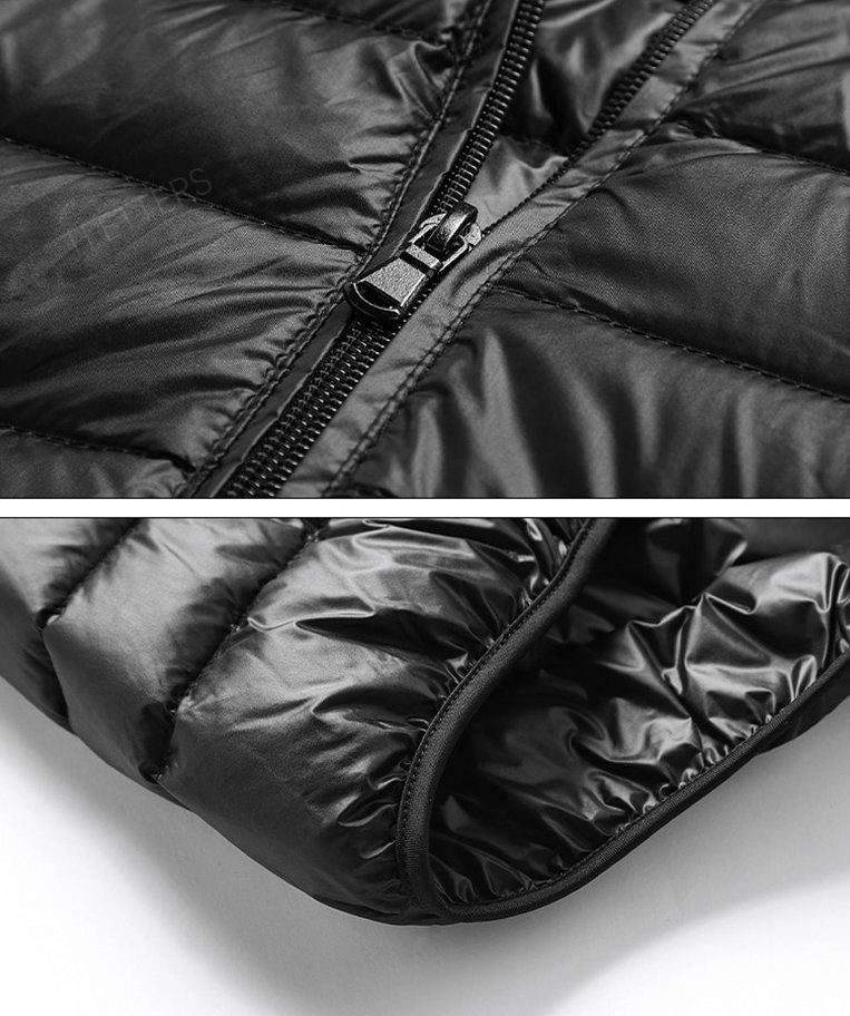 Close-up of black men's quilted lightweight warm down vest with zipper, 90% white duck down for maximum insulation.
