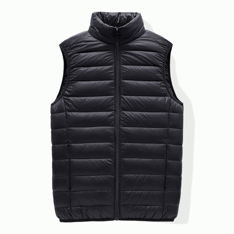 Men's quilted lightweight black down vest with zipper, ideal for chilly weather. Stylish, solid pattern, polyester lining, and zipper closure.
