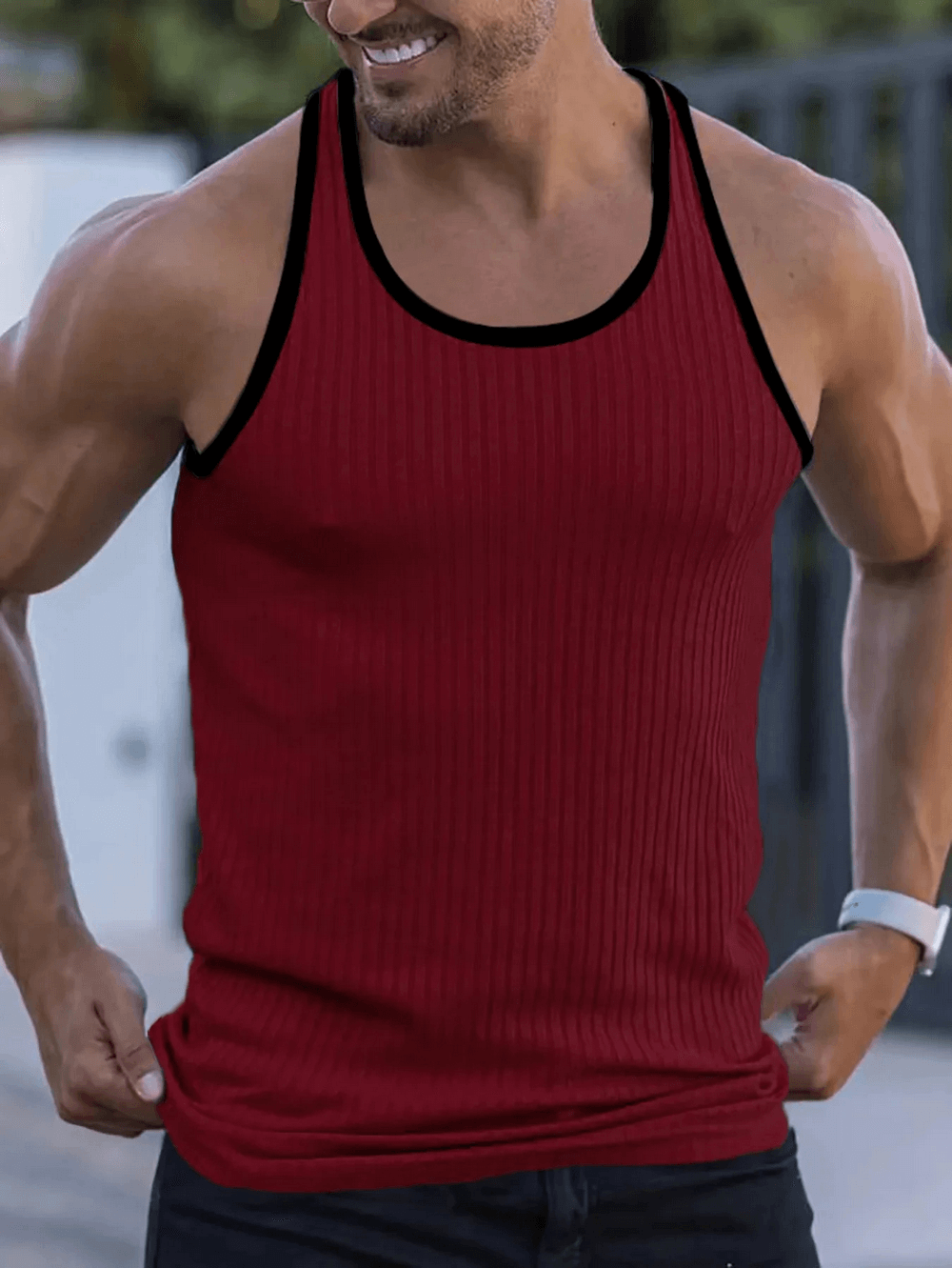 Man wearing Men's Ribbed Athletic Tank Top for Gym and Fitness - SF4111 in red with contrast edging, ideal for workouts and training.