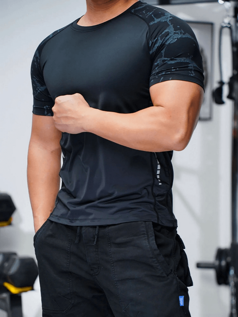 Men's Quick-Dry Short Sleeve Workout Tee in black polyester with stylish print for active lifestyle.