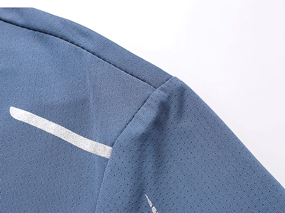 Alt Tag: Men's Soft Elasticity T-shirt for Outdoor Sports - SF4405 close-up of breathable mesh fabric and reflective shoulder detail
