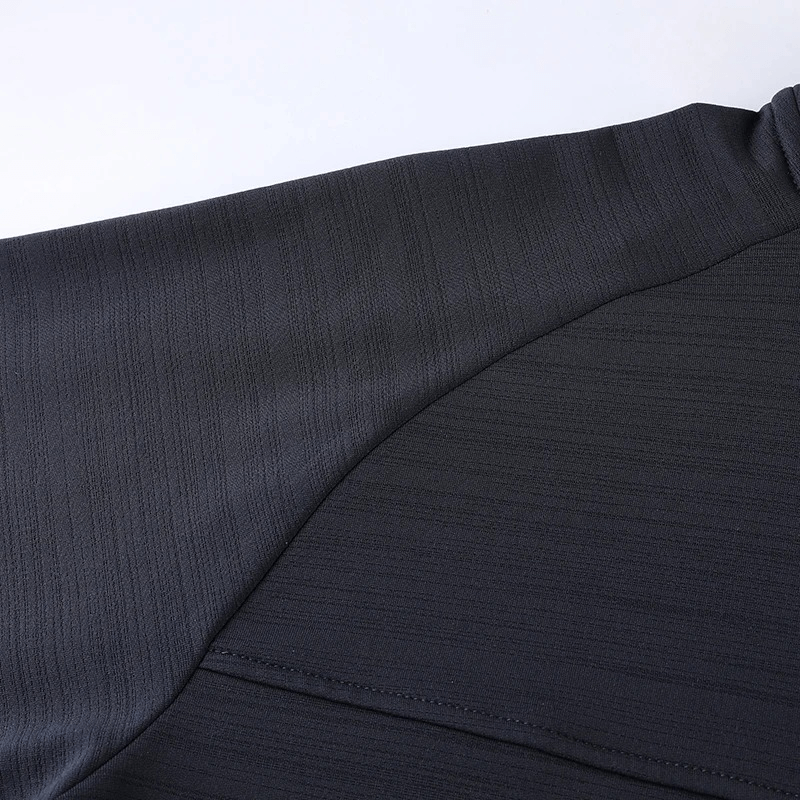 Close-up of Men's Sports Running Dry Fit Jacket SF1835 showing texture, elastic fabric, and seam details in dark color.