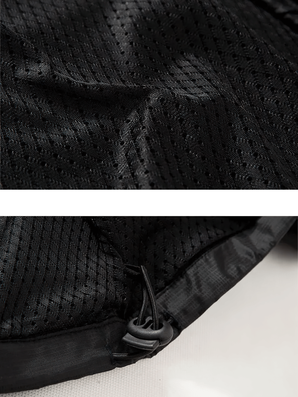 Close-up of black polyester sports tracksuit fabric texture with drawstring detail.