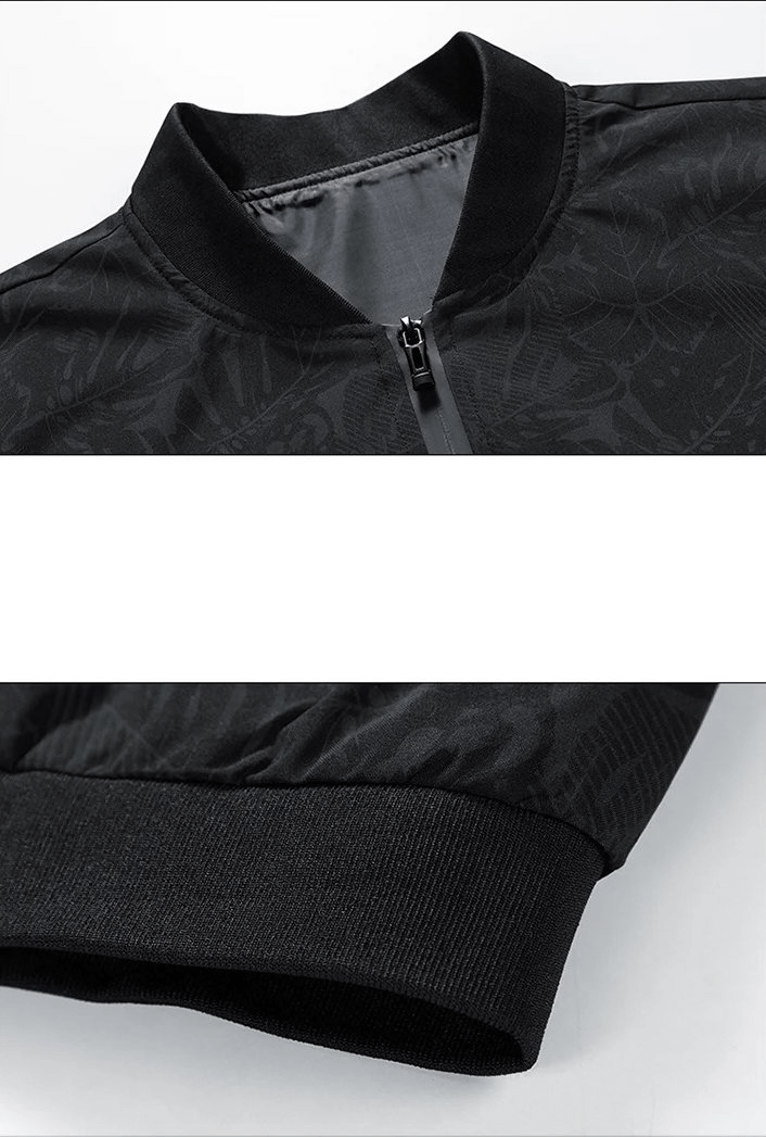 Close-up of Men's Tactical Camo Jacket in black with zipper closure and ribbed cuffs, made from weatherproof polyester.