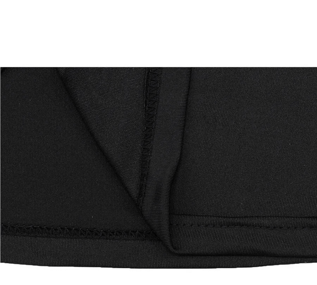 Close-up of Men's Thermal Jersey leggings set fabric, highlighting breathable and quick-drying material with geo pattern.