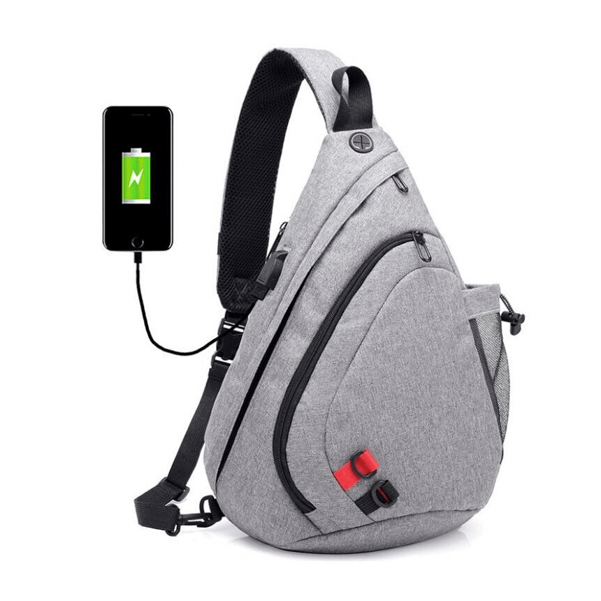 Gray crossbody bag with USB charging port and multiple compartments