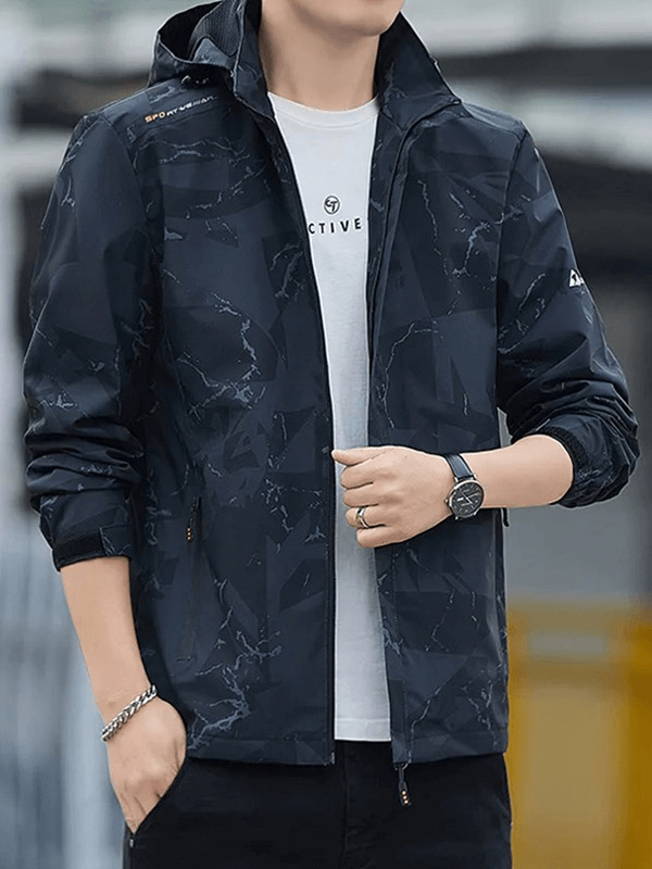 Men's waterproof hiking jacket with geo print design, zipper closure, and hood, perfect for outdoor adventures in wet weather.