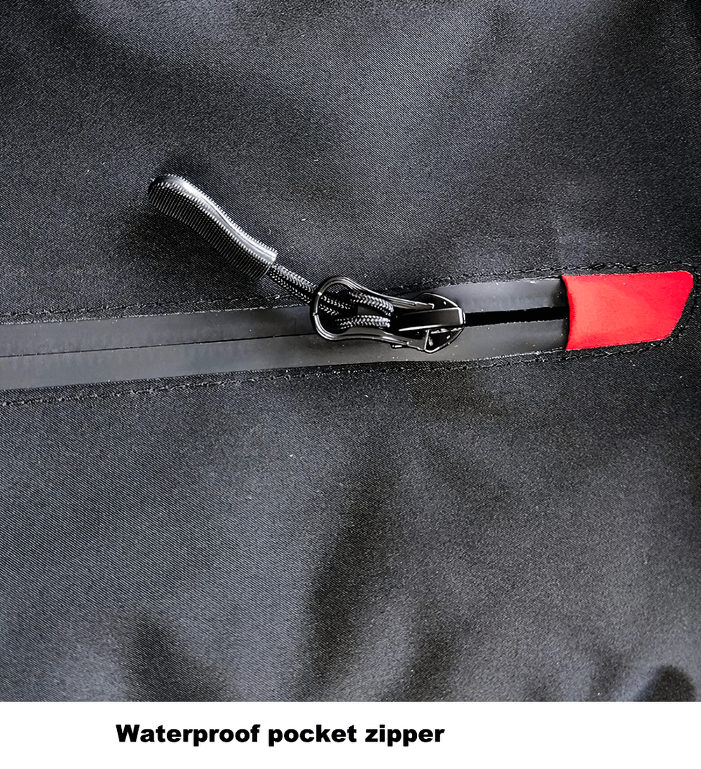 Alt Tag: Close-up of waterproof pocket zipper on men's ski jacket. Black fabric with a sleek red accent and durable zipper pull.