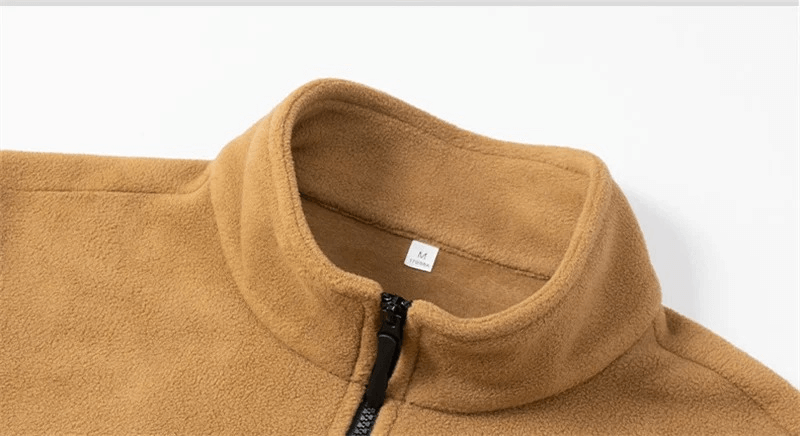 Men's windproof zip fleece jacket in camel color with a casual fit, featuring a high collar and black zipper detail.