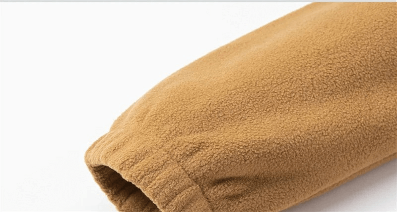 Close-up of a men's windproof zip fleece jacket sleeve, showcasing durable, breathable polyester material in a casual fit.