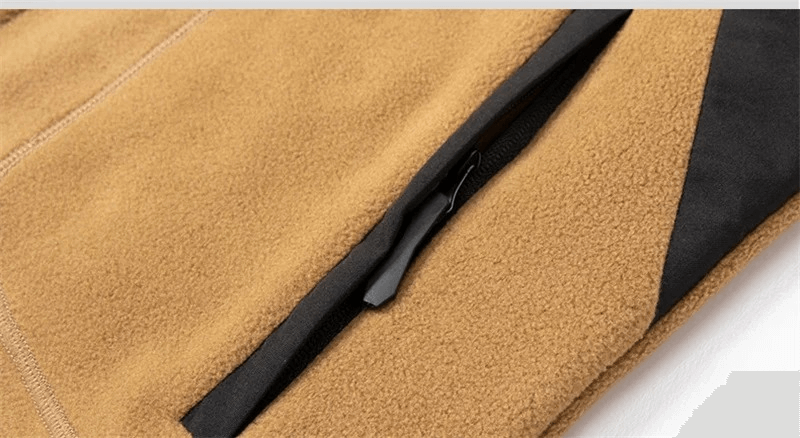 Close-up of tan Men's Windproof Zip Fleece Jacket SF1997 with zip pocket detail, ideal for outdoor activities and camping.