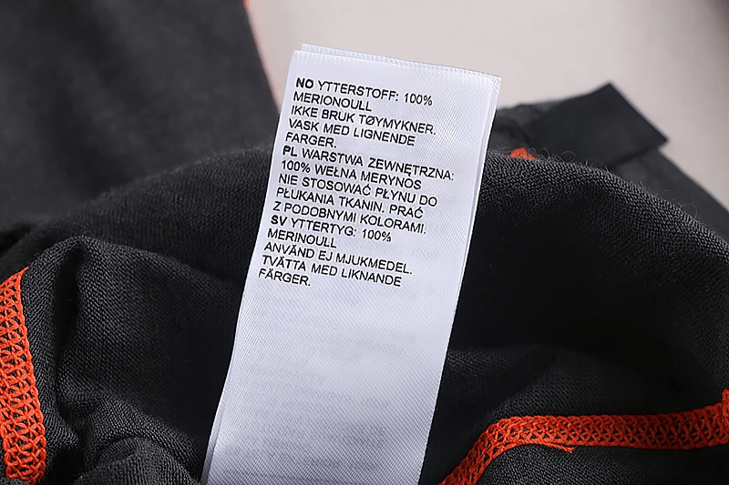 Care label for men's merino wool thermal long pants showing fabric and washing instructions.