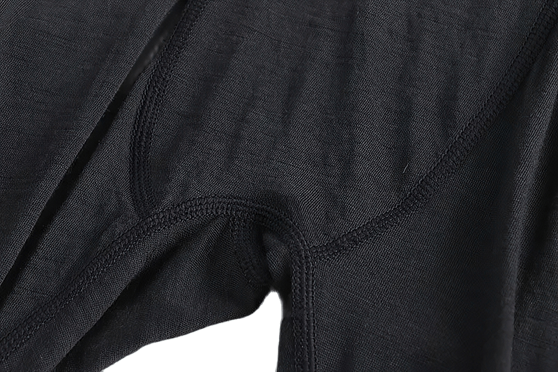 Close-up of merino wool thermal long pants for men, SF1856, showcasing the insulating fabric ideal for winter activities.
