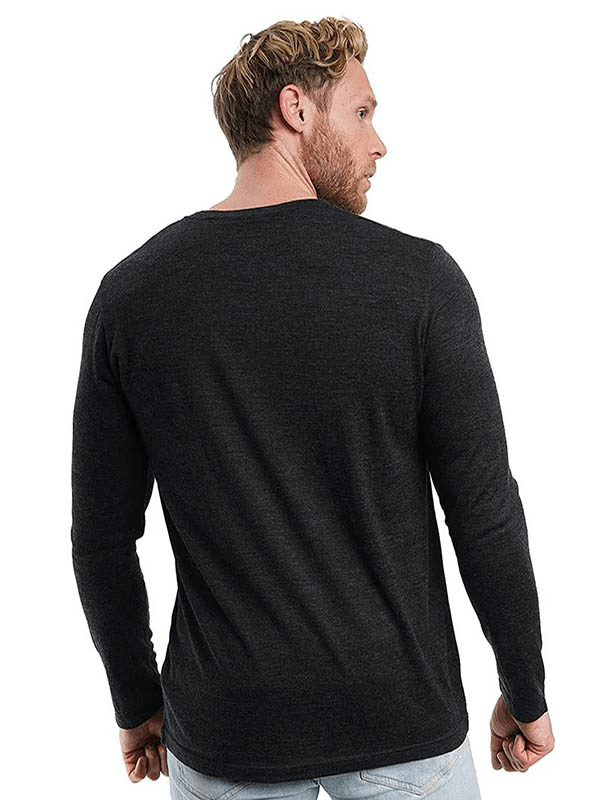 Rear view of a man wearing a black Merino Wool Thermal Long Sleeve Top, showcasing the lightweight and breathable fabric design.