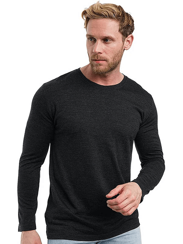 Man wearing Merino Wool Thermal Long Sleeves Top for Men, SF1808, in black color, showcasing comfortable and stylish wear for cold days.