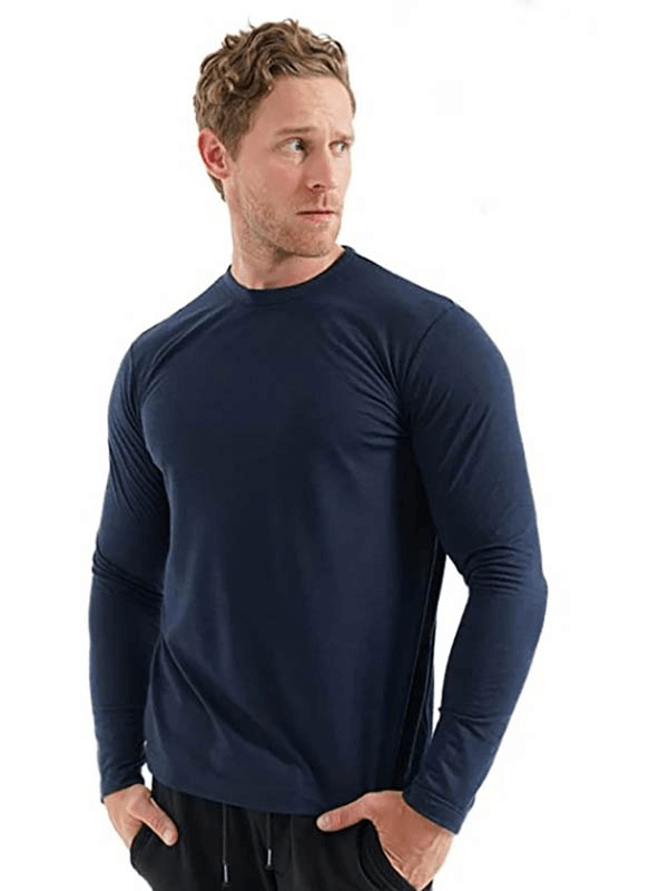 Men's navy Merino wool thermal long sleeve top, lightweight and breathable, perfect for warmth and style.