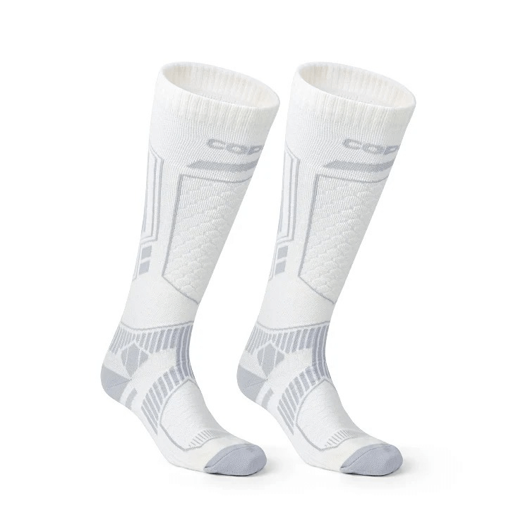 White merino wool thermal ski socks for men and women, ideal for winter sports, offering warmth and moisture-wicking properties.