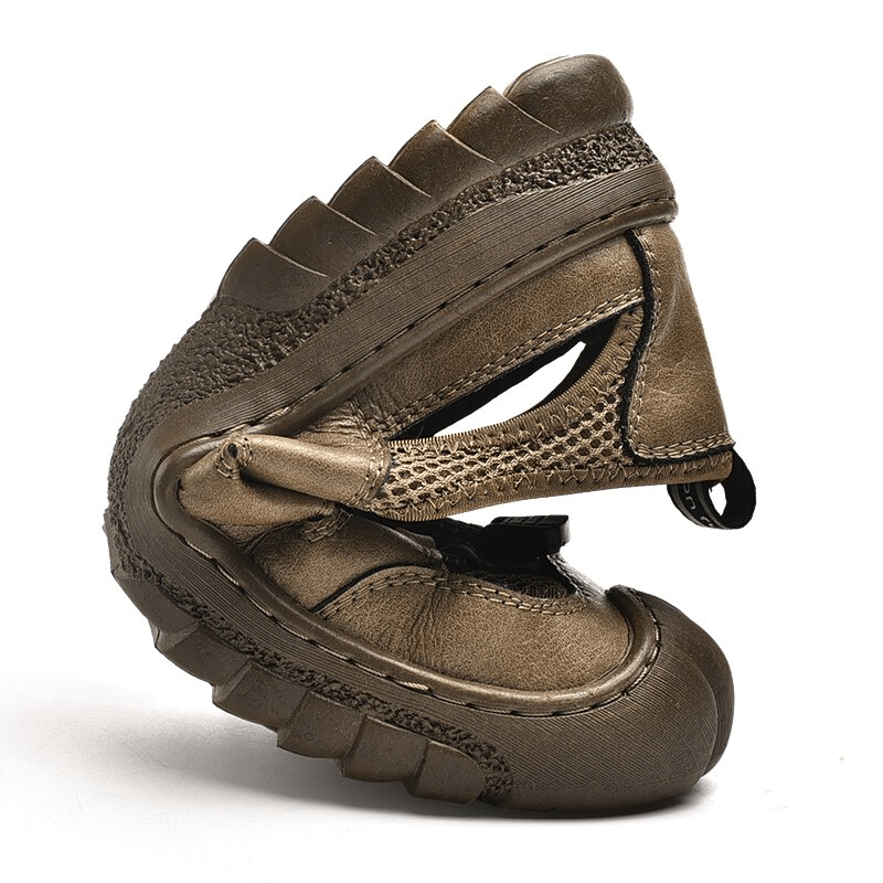 Alt Tag: Mesh breathable men's sandal with flexible sole, shown bent to highlight flexibility and comfort, SF1417.