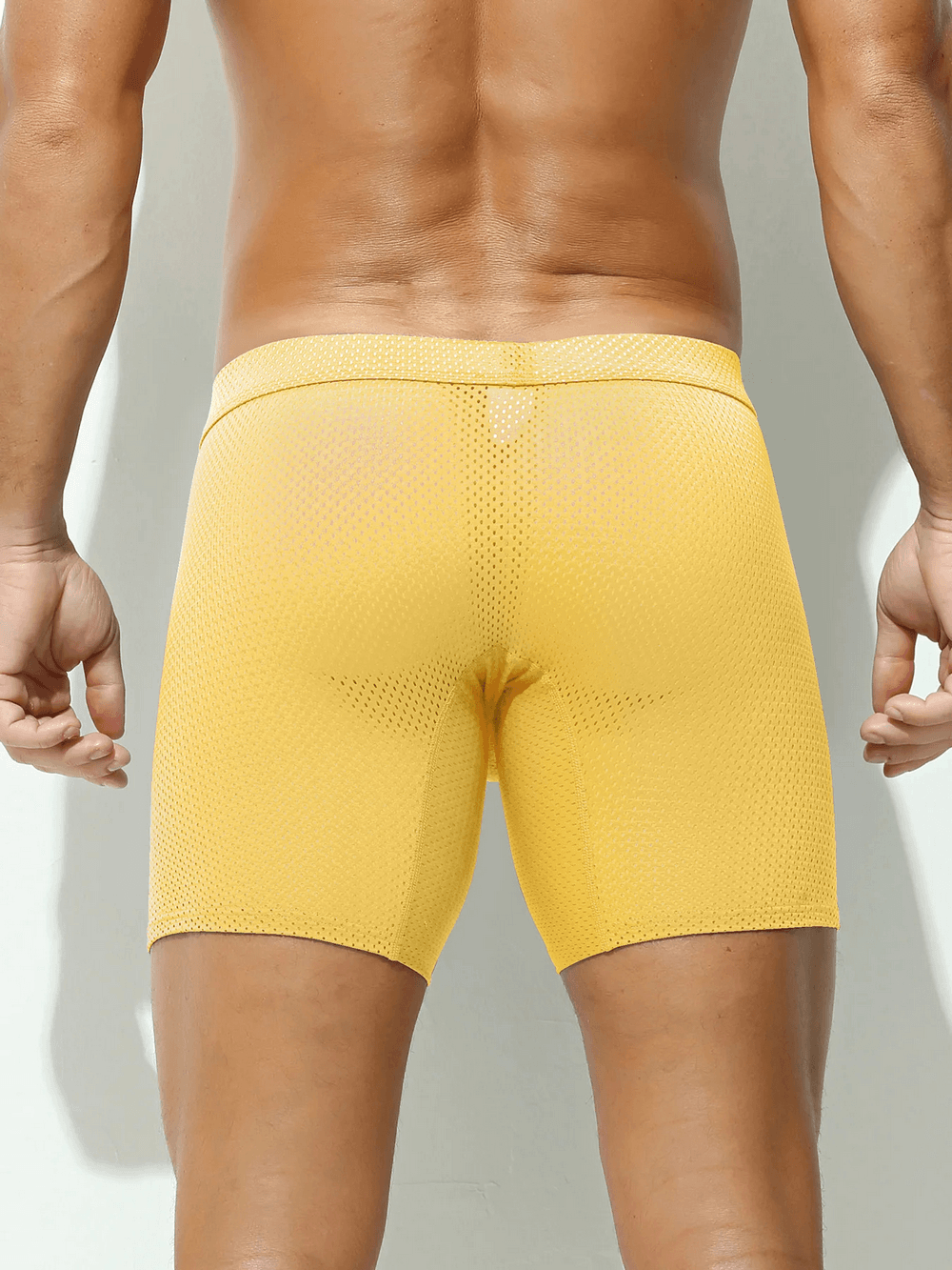 Mesh Long Boxer Briefs with U Convex Pouch - SF4748 in yellow, showcasing sporty perforated design from the back.