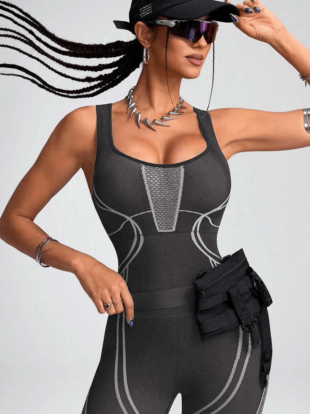 Woman wearing Mesh Panel Yoga Jumpsuit with Sculpt Fit Design - SF4229, perfect for yoga and gym workouts.