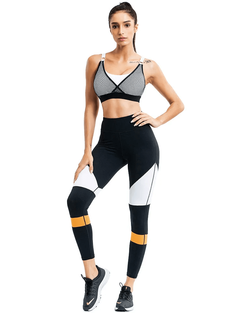 Women's mesh sports bra and colorblock leggings set SF2124, chic activewear for yoga, running, and workouts.