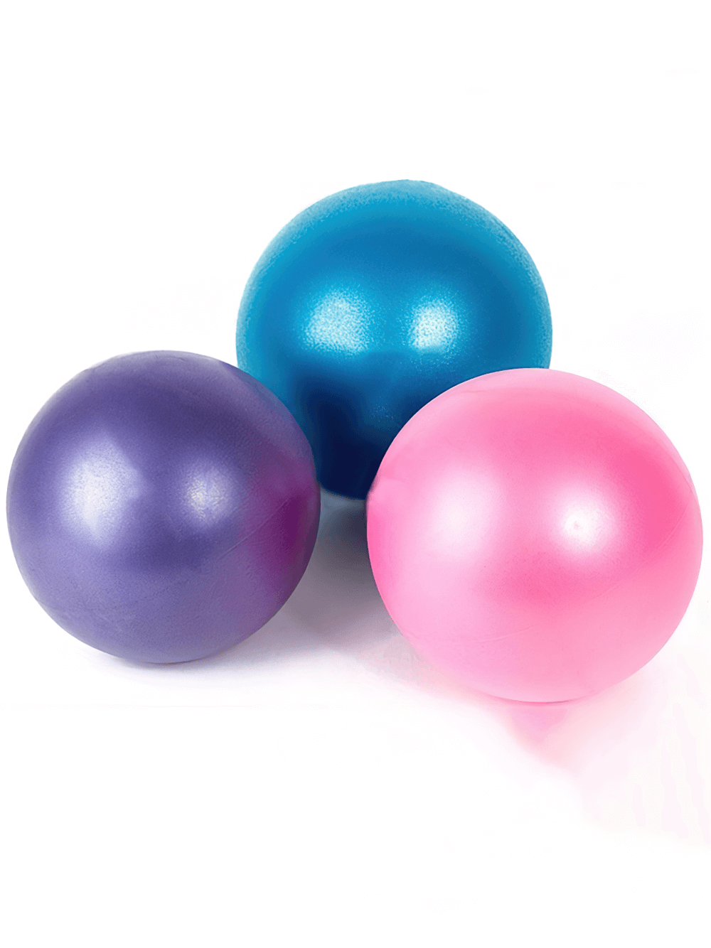 Vibrant mini yoga balls in pink, blue, and purple, perfect for Pilates, core training, and enhancing flexibility and stability.