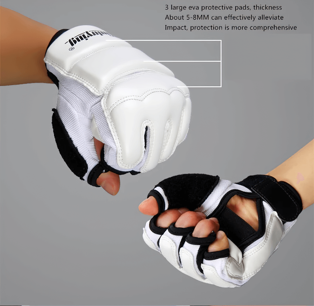 White MMA sparring gloves with EVA impact protection, showcasing open palm design and reinforced leather exterior for martial arts training.