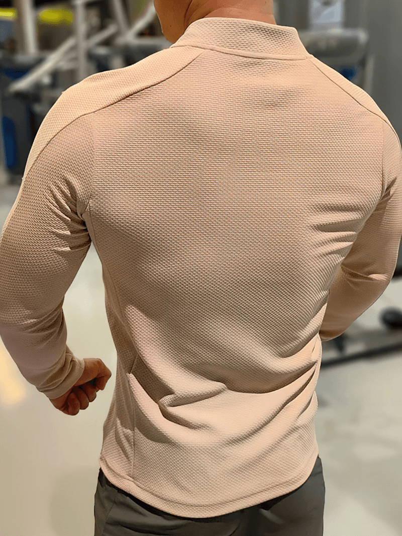 Back view of a modern zip-up textured sports jacket with O-Neck, ideal for running, showing its breathable, durable fabric design.