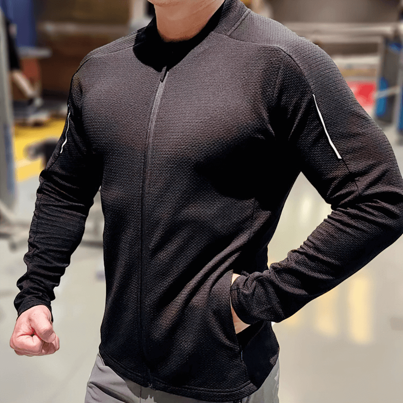 Modern zip-up textured black sports jacket for men with breathable fabric, O-Neck collar, and pockets, perfect for running.