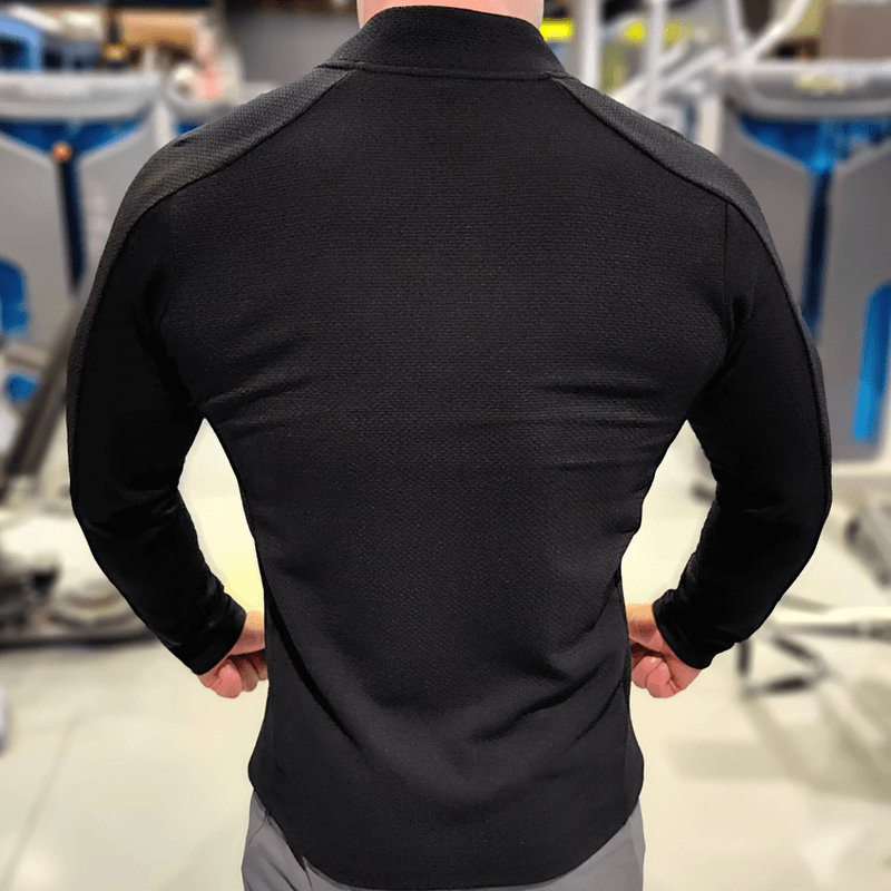 Back view of modern zip-up textured sports jacket with pockets in black, ideal for running, crafted from breathable cotton blend for men.