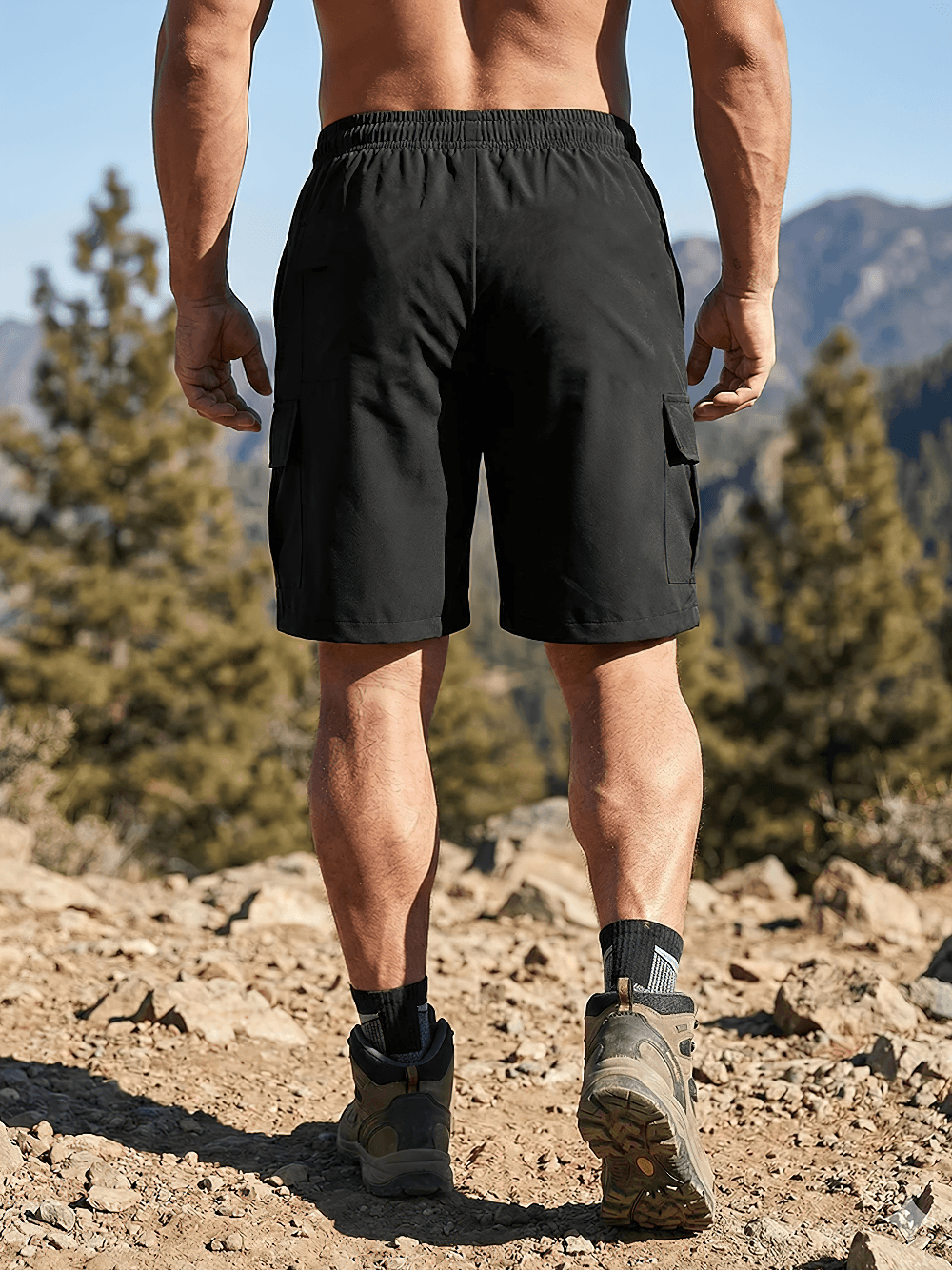 Multi-Pocket Outdoor Utility Shorts for Hiking - SF4551 being worn on a man in the mountains.