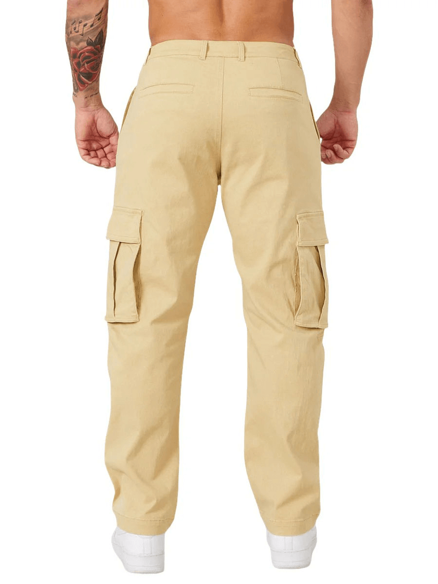 Rear view of beige multi-pocket training cargo trousers for men, showcasing durable, breathable design with ample storage.