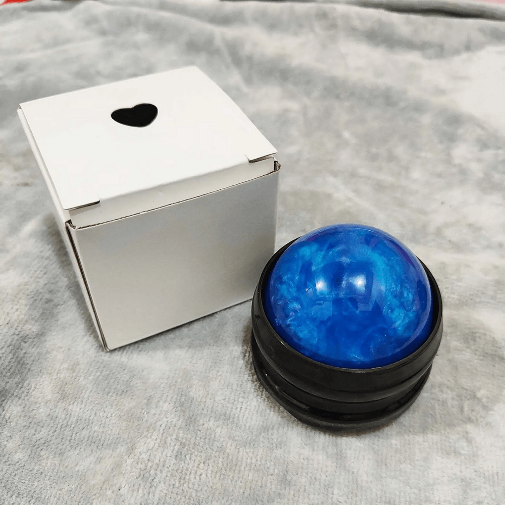 Blue handheld massage roller ball with packaging, ideal for deep tissue massage and muscle relaxation, SF3274 model.